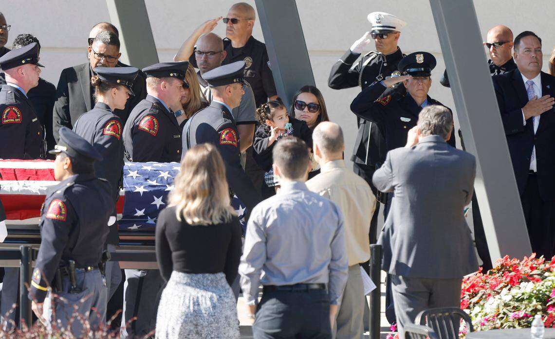 The casket of Raleigh Police Officer Gabriel Torres is brought into Cross Assembly Church in Raleigh, N.C. for his funeral Saturday, Oct. 22, 2022. Officer Torres was killed during a mass shooting Oct. 13.