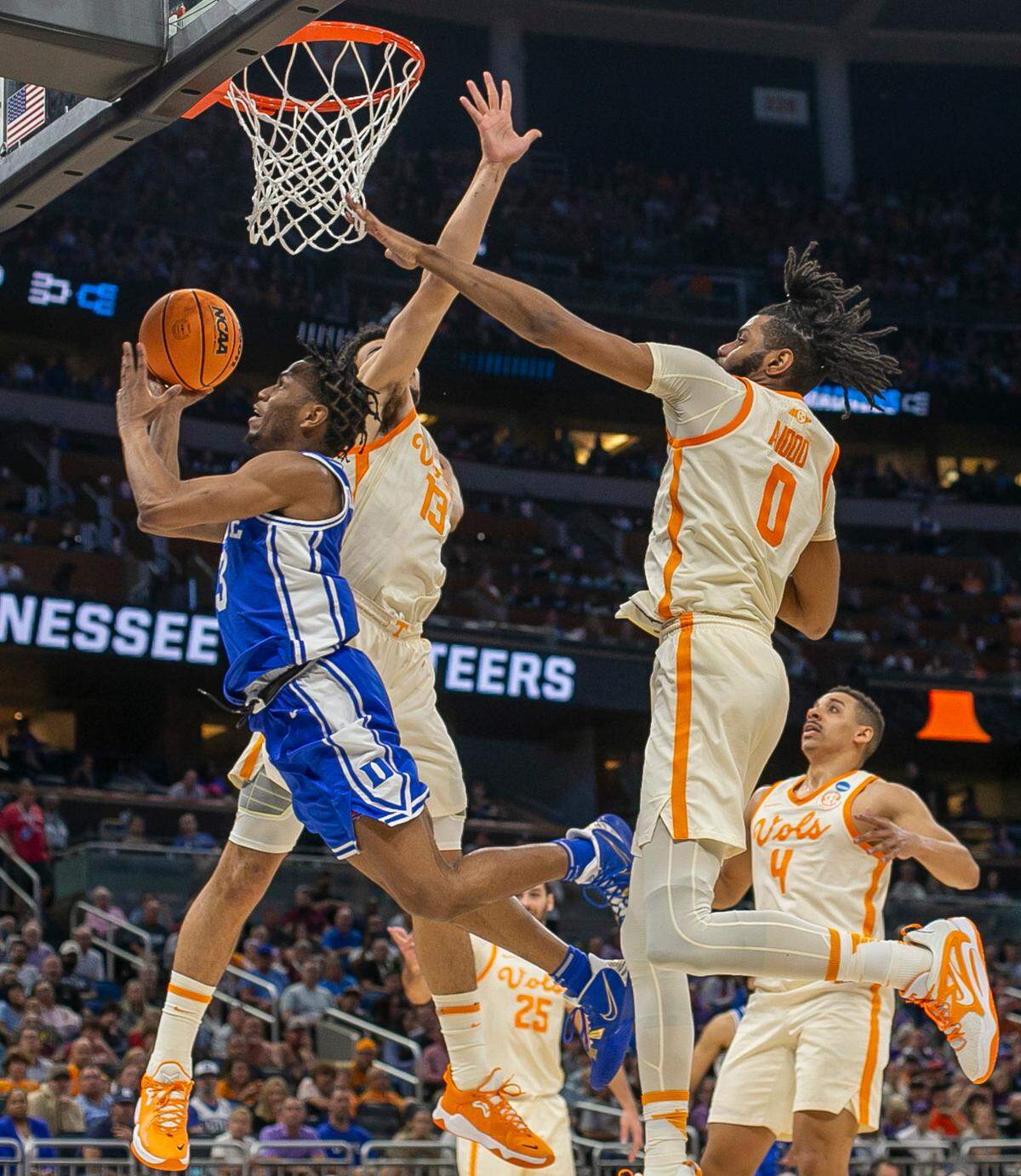 Duke’s Jeremy Roach (3) drives to the basket between Tennessee’s Oliver Nkamhoua (13) and Jonas Aidoo (0) in the second half during the second round of the NCAA Tournament on Saturday, March 18, 2023 at the Amway Center in Orlando, Fla.