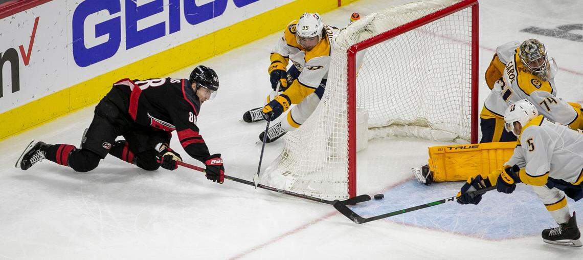 Carolina Hurricanes’ Martin Necas (88) scores on a wrap around on Nashville goalie Juuse Saros (74) to tie the score 2-2 in the third period in game five of their first round Stanley Cup Series on Tuesday, May 25, 2021 at PNC Arena in Raleigh, N.C.