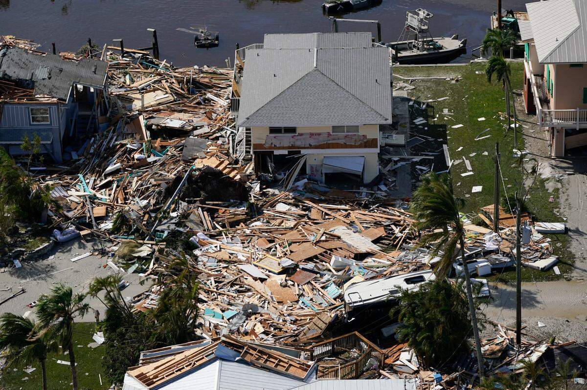 Damaged homes are seen in the aftermath of Hurricane Ian, Thursday, Sept. 29, 2022, in Fort Meyers Beach, Fla.