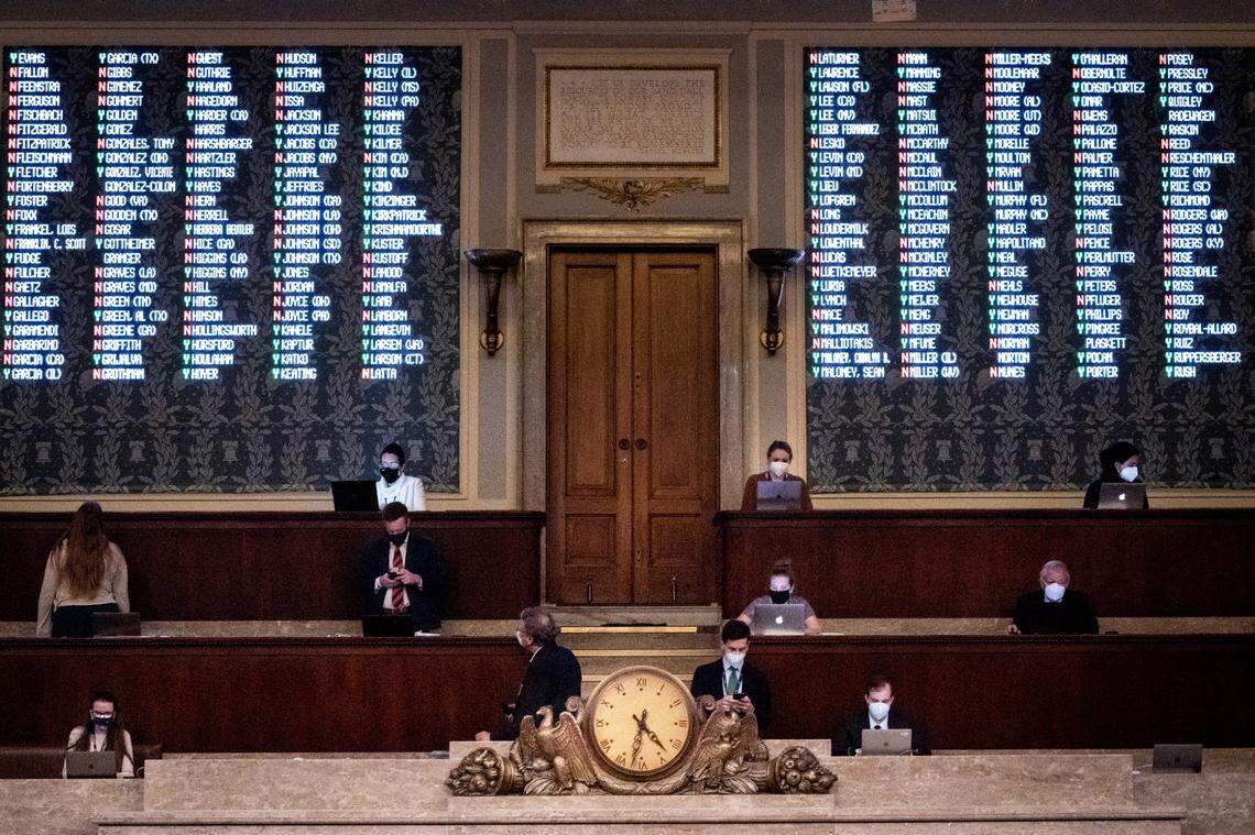 Votes are tracked in the House chamber as the House votes to impeach President Donald Trump for the second time, at the Capitol in Washington on Wednesday, Jan. 13, 2021. The House on Wednesday impeached President Trump for inciting a violent insurrection against the United States government, as 10 members of the presidentÕs party joined Democrats to charge him with high crimes and misdemeanors for an unprecedented second time.