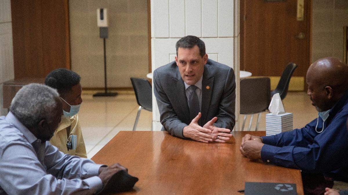 State Sen. Graig Meyer, center, meets with a group of Black farmers including Moe Matthews, far left, Calvin Jones, and Charles Jones, right, at the North Carolina Legislative Building Thursday, Feb. 23, 2023. The farmers criticized the language of a proposed medical marijuana bill, which they say opens the door to corporate monopolization and shuts locals out.