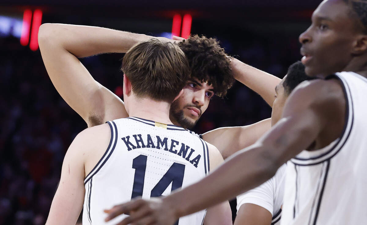 Duke’s Nikolas Khamenia (14) consoles Cameron Boozer (12) after Texas Tech’s 82-81 victory over Duke in the SentinelOne Classic at Madison Square Garden in New York City, N.Y., Saturday, Dec. 20, 2025.