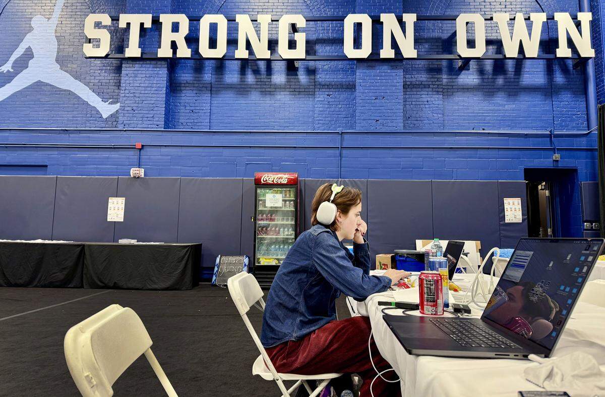 Shelby Swanson works on her story after UNC’s victory over Oregon State in the first round of the NCAA women’s basketball tournament at Carmichael Arena in March 2025.