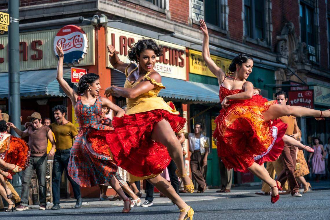 This image released by 20th Century Studios shows, from left, Ilda Mason as Luz, Ariana DeBose as Anita, and Ana Isabelle as Rosalia in “West Side Story.”