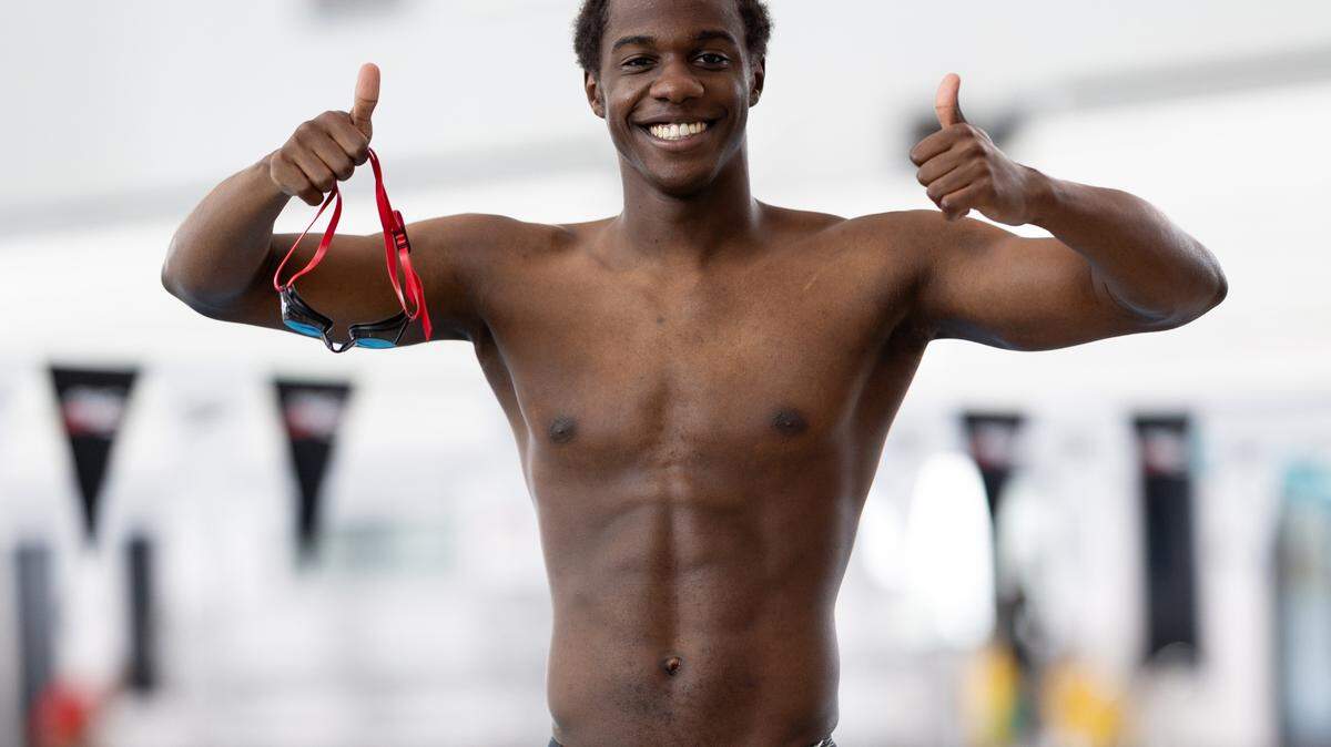 Jesse Ssengonzi swam for the Marlins of Raleigh, Green Hope High School and the University of Chicago and will represent Uganda at Paris Olympics