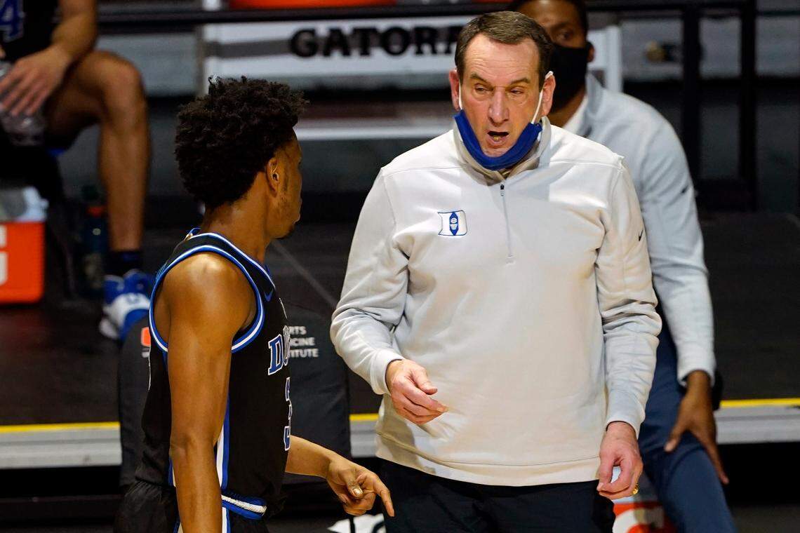 Duke head coach Mike Krzyzewski talks to guard Jeremy Roach (3) during the second half of an NCAA college basketball game against Miami, Monday, Feb. 1, 2021, in Coral Gables, Fla.