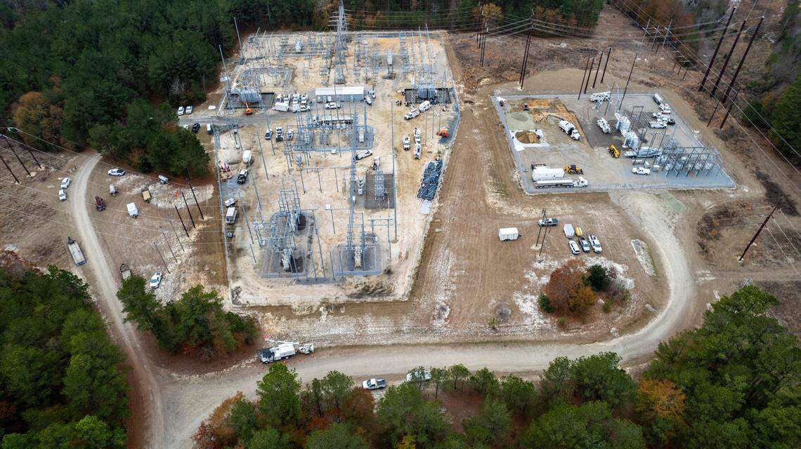 An aerial view of an electrical power substation in West End Tuesday, Dec. 6, 2022 where crews are working to repair damage after two deliberate attacks on electrical substations in Moore County Saturday evening. The attacks caused days-long power outages for tens of thousands of customers.
