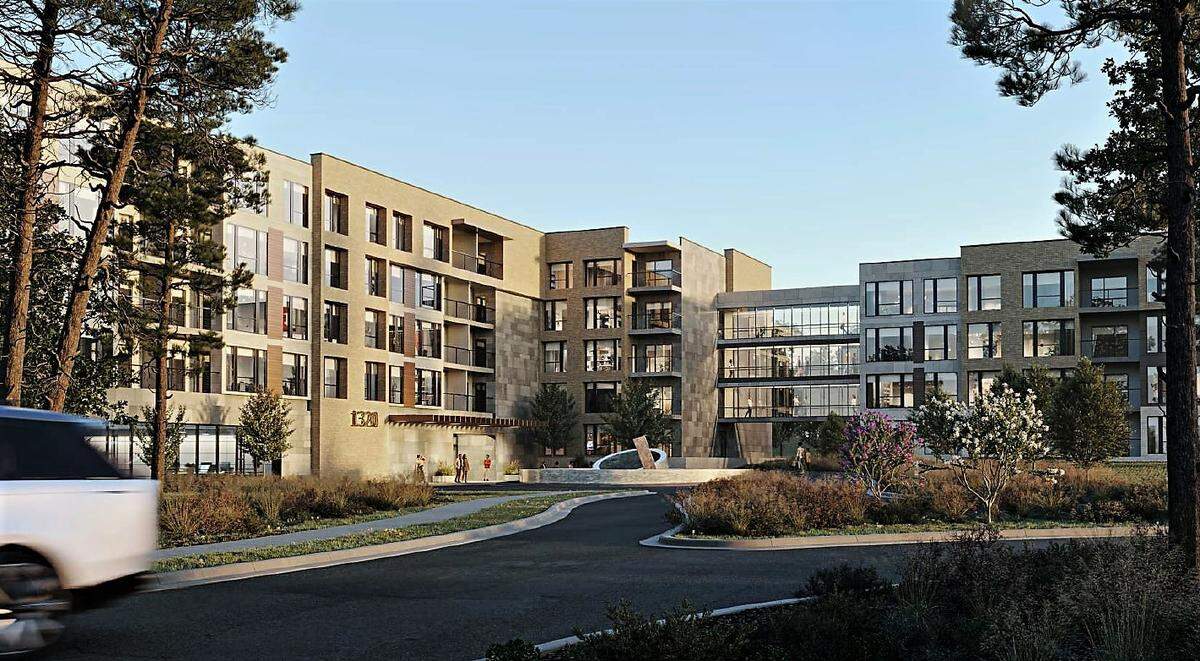 An architectural rendering of the proposed Reserve at Blue Hill apartments on Ephesus Church Road. The concept plan is a roughly drawing of what could be built and is subject to change through the town’s development process.