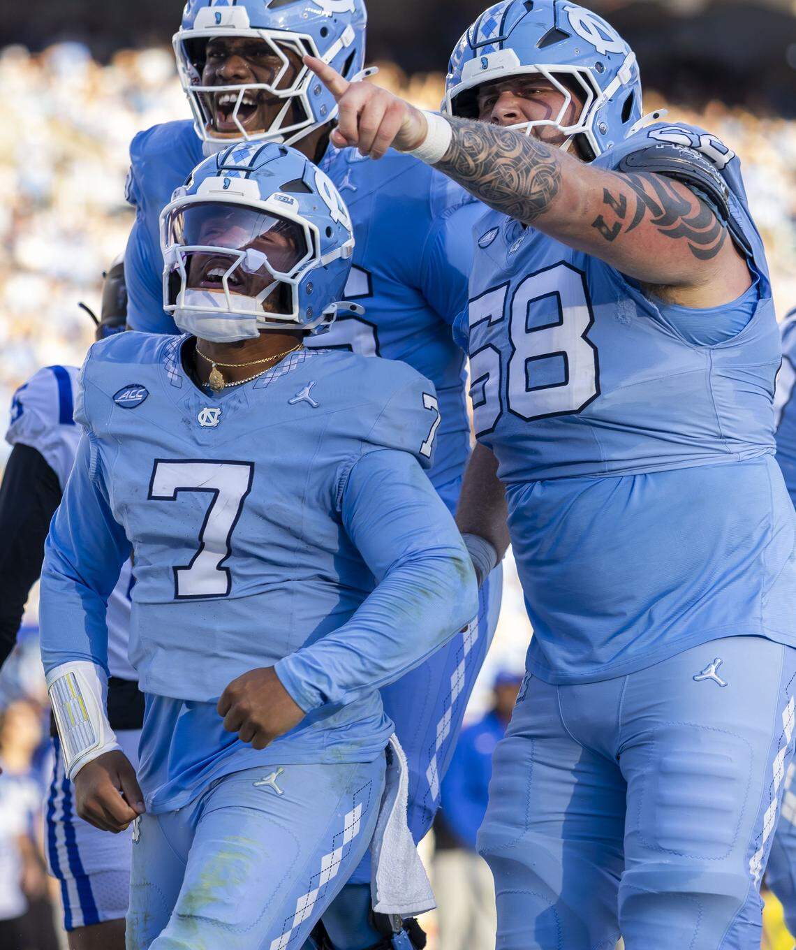 North Carolina quarterback Gio Lopez (7) reacts after scoring a touchdown on a one yard run to take a 7-0 lead against Duke on Saturday, November 22, 2025 at Kenan Stadium in Chapel Hill, N.C.