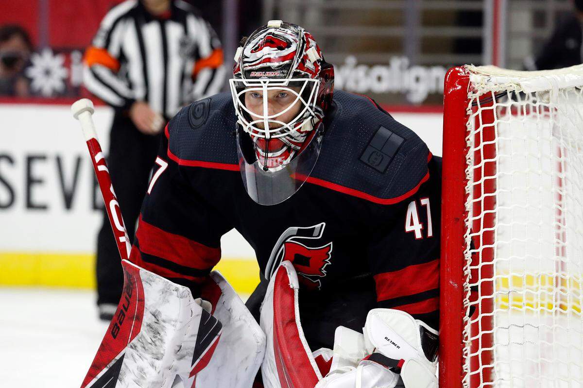 Carolina Hurricanes goaltender James Reimer watches the puck during the third period of the team’s NHL hockey game against the Dallas Stars in Raleigh, N.C., Saturday, Jan. 30, 2021. (AP Photo/Karl B DeBlaker)