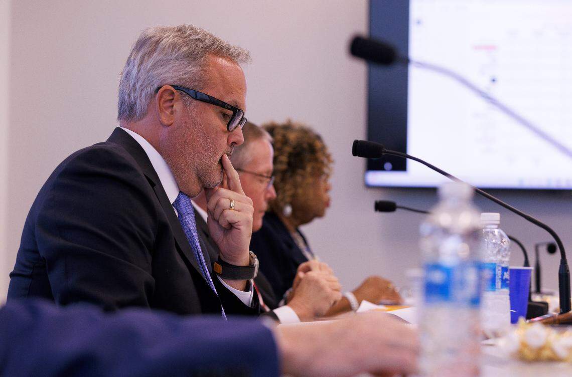 Alex Mitchell listens during a meeting of the UNC System Board of Governors university governance committee on Wednesday, Sept. 11, 2024, in Raleigh, N.C.