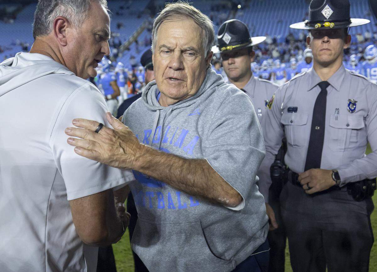 North Carolina coach Bill Belichick congratulates Texas Christian University head coach Sonny Dykes following the Horned Frogs’ 48-14 victory on Monday, September 1, 2025 at Kenan Stadium in Chapel Hill, N.C. 
