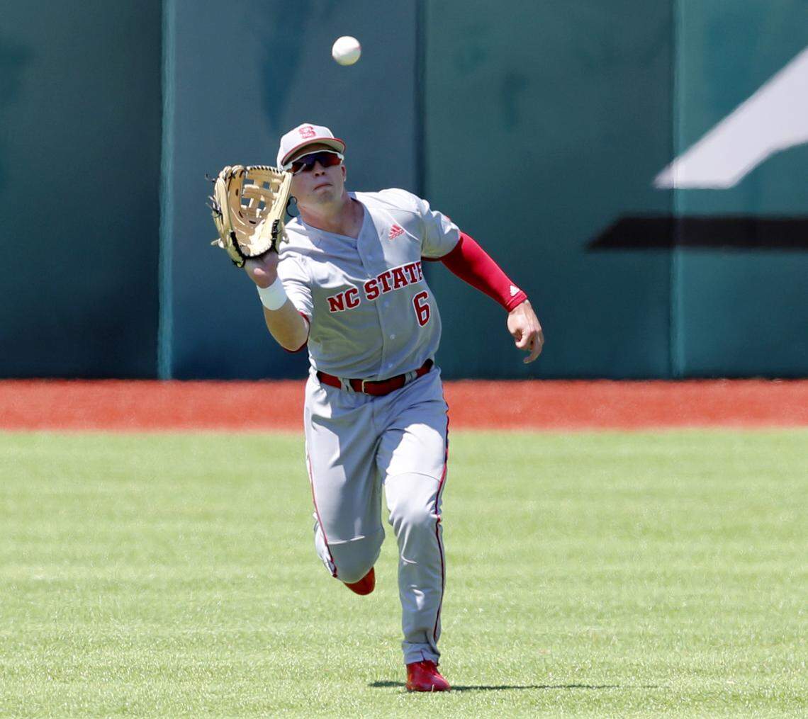 N.C. State's Brett Kinneman (6) makes the catch during N.C. State's 2-1 victory over Duke at Jack Coombs Field in Durham Saturday, April 21, 2018.