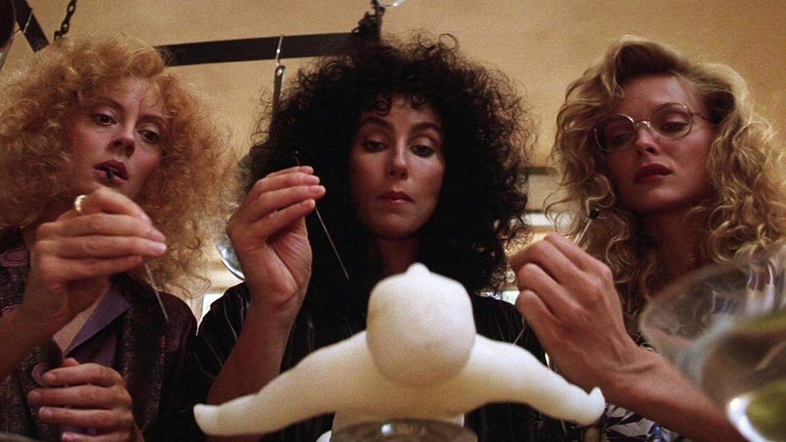 (L-R): Susan Sarandon, Cher and Michelle Pfeiffer in the 1987 movie “The Witches of Eastwick.”