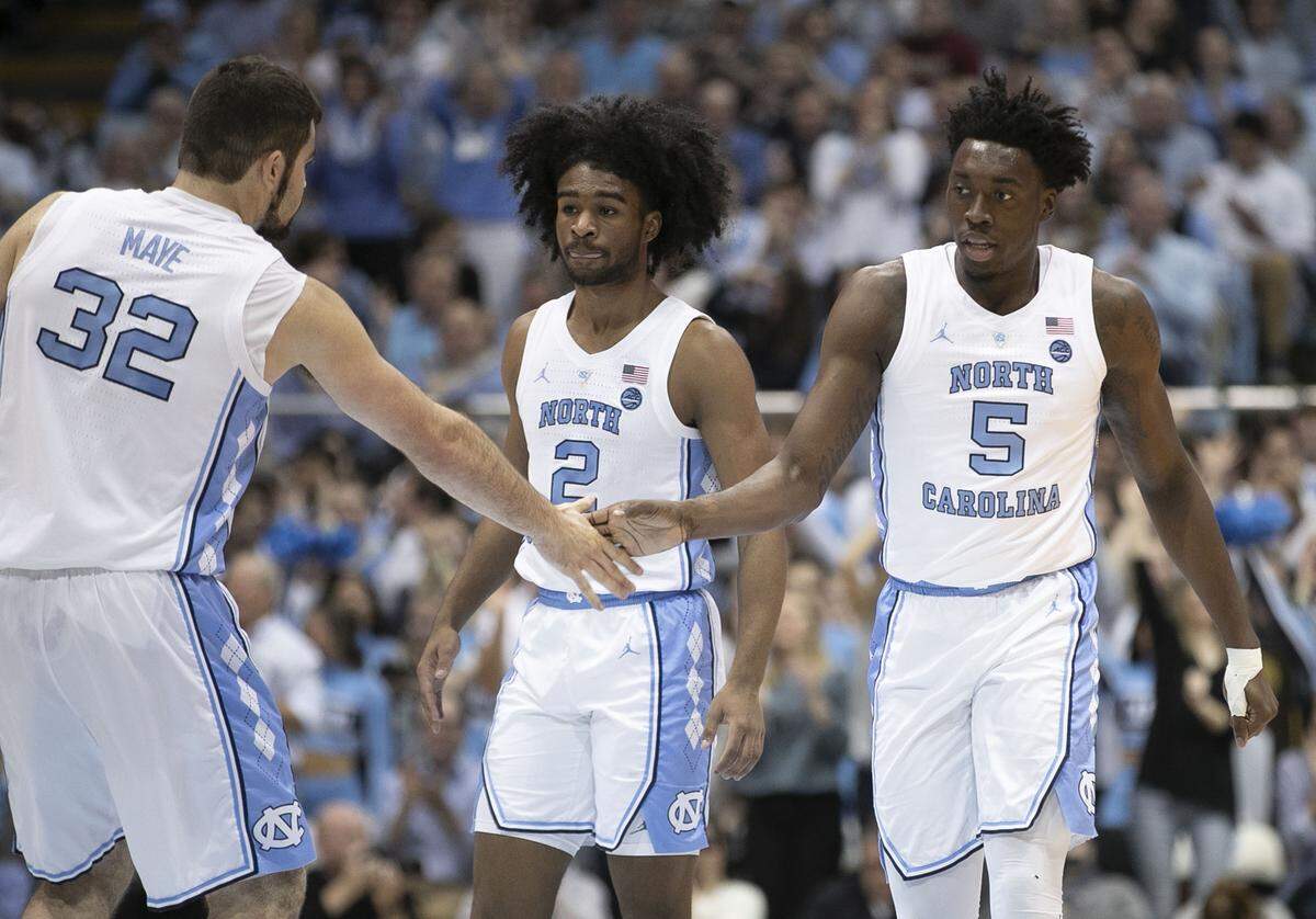North Carolina’s Luke Maye (32) congratulates teammate Nassir Little (5) after a score in the first half against Florida State on Saturday, February 23, 2019 at the Smith Center in Chapel Hill, N.C.
