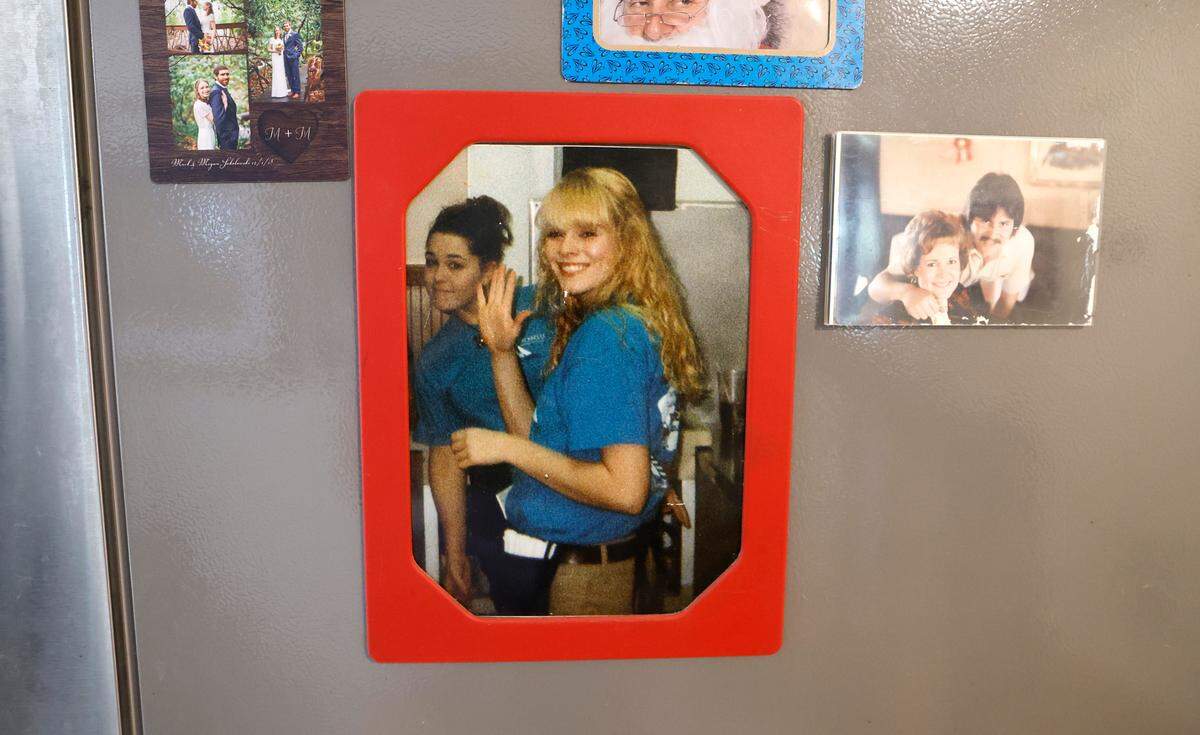A photo of Holly Wortham is seen on the refrigerator of Bryon and Kim Wortham’s home in Sanford, N.C. The Worthams opened Holly’s Nest Animal Rescue in tribute to their daughter Holly, who died in a car crash in 2004.