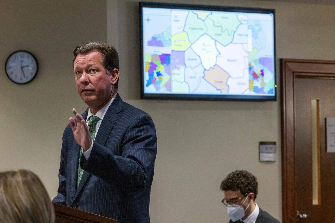 Phil Strach, an attorney for Republican legislators, questions Rep. Destin Hall , a top Republican redistricting official, not pictured, during a partisan gerrymandering trial Wednesday, Jan. 5, 2022 at Campbell University School of Law in Raleigh, NC.