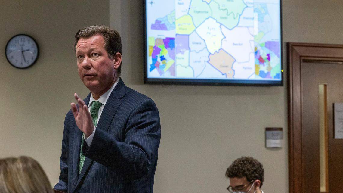 Phil Strach, an attorney for Republican legislators, questions Rep. Destin Hall , a top Republican redistricting official, not pictured, during a partisan gerrymandering trial Wednesday, Jan. 5, 2022 at Campbell University School of Law in Raleigh, NC.