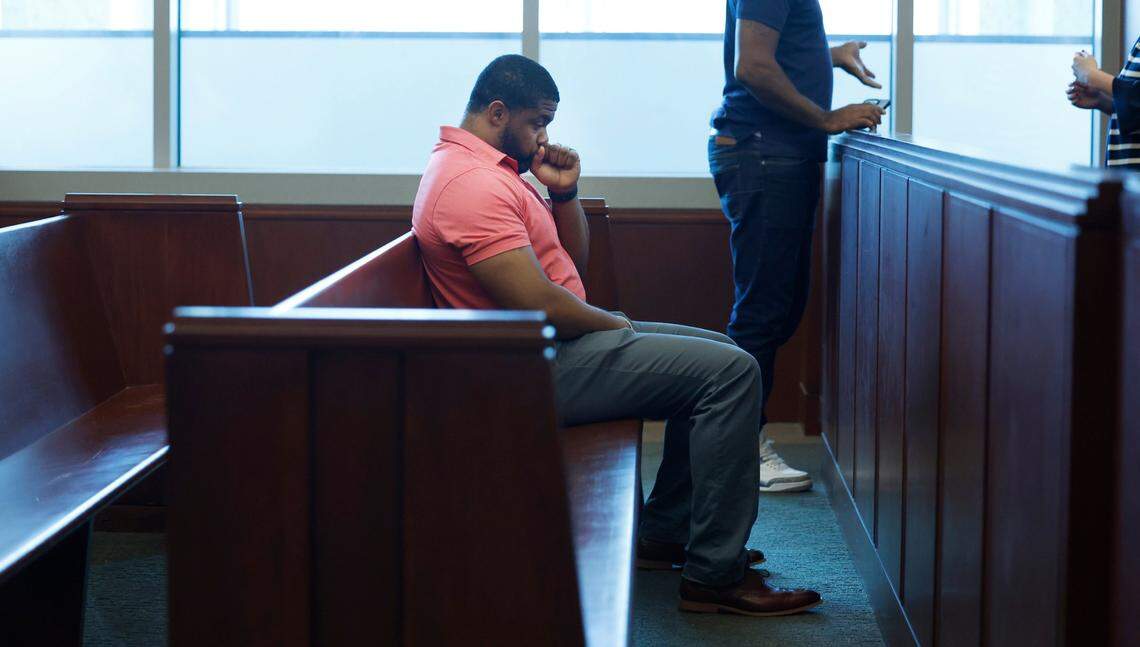 Kevin Spruill awaits a dismissal in his case in the gallery of a Wake County courtroom Aug. 24.