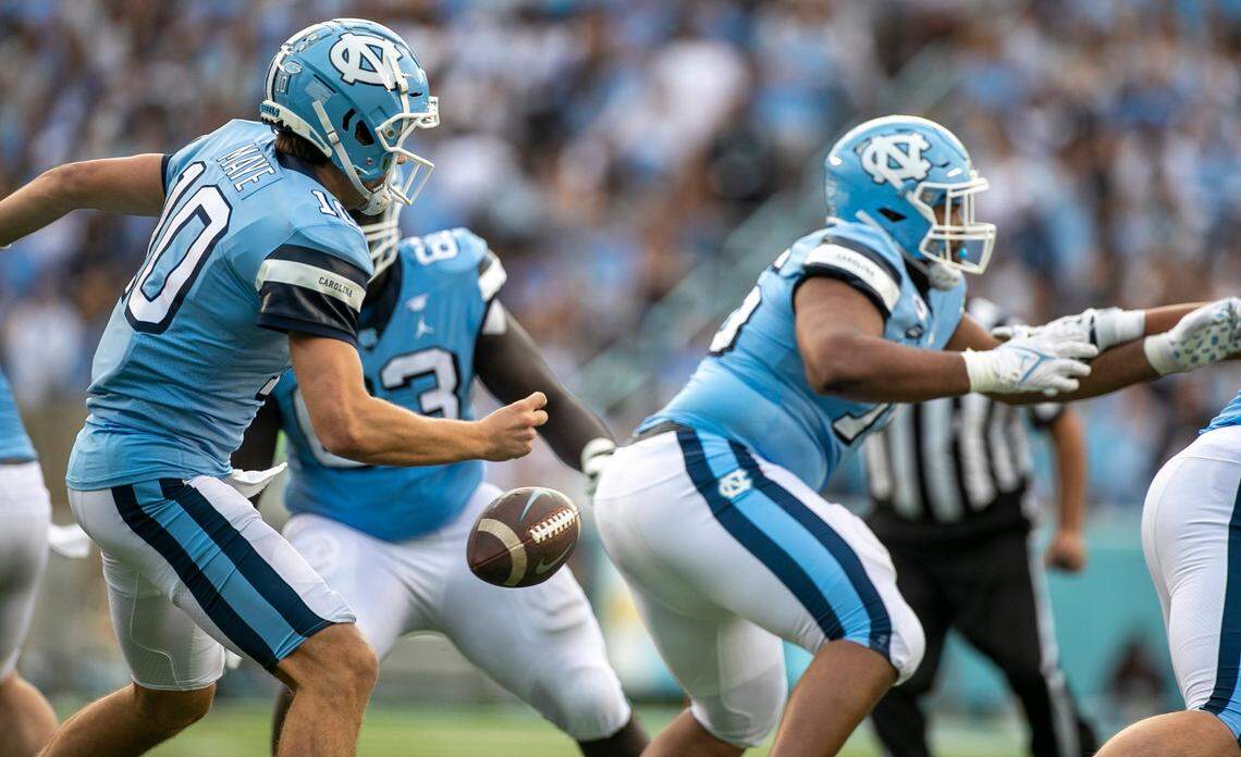 North Carolina quarterback Drake Maye (10) fumbles the ball in the third quarter against Notre Dame on Saturday, September 24, 2022 at Kenan Stadium in Chapel Hill, N.C. Notre Dame’s Justin Ademilola (9) recovered the fumble.