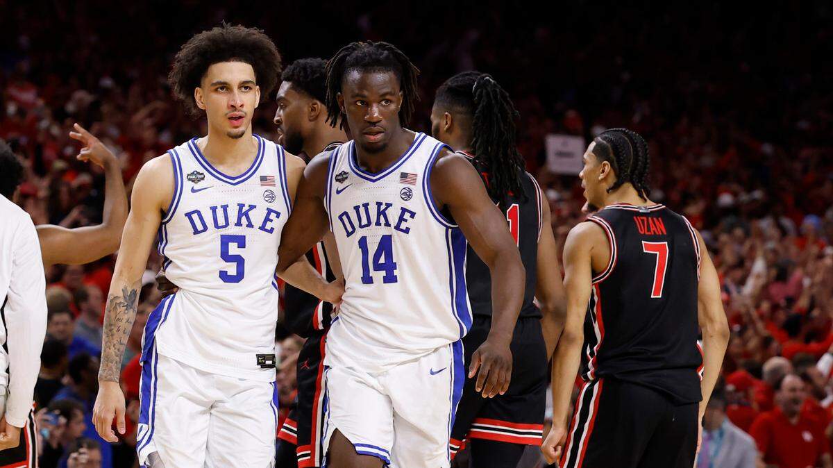 Duke’s Tyrese Proctor and Sion Jamesleave the floor after falling to Houston in the Final Four.