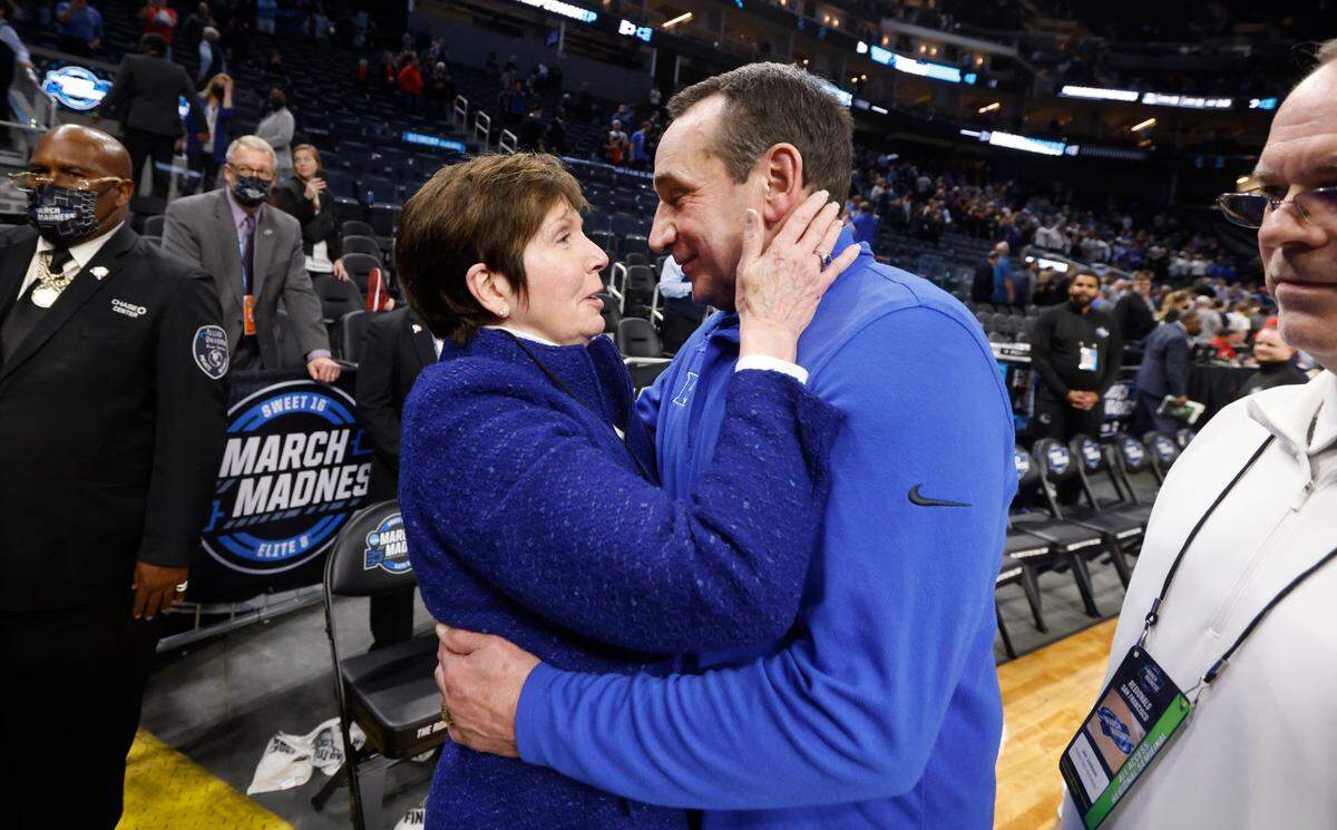 Duke head coach Mike Krzyzewski and his wife, Mickie, embrace after Duke’s 78-73 victory over Texas Tech in the Sweet 16 round of the NCAA Tournament at the Chase Center in San Francisco, Calif., Thursday, March 24, 2022.