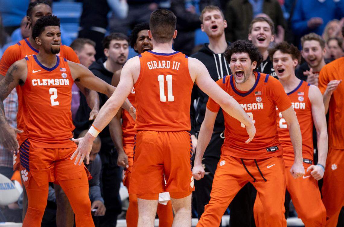 Clemson’s Joseph Girard III (11) is welcomed to the bench as they celebrate their 80-76 victory over North Carolina on Tuesday, February 6, 2024 at the Dean E. Smith Center in Chapel Hill, N.C. Girard scored 21 points in the victory.