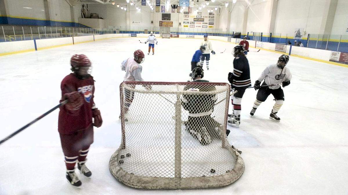 Young hockey fans compete in pickup games at the SportsPlex ice rink in Hillsborough in this 2006 file photo.