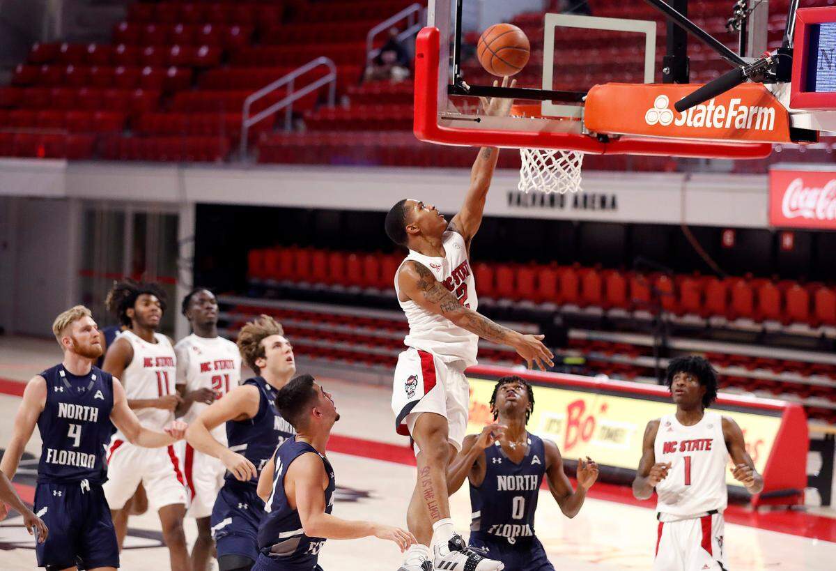 N.C. State’s Shakeel Moore (2) makes a basket during the second half of N.C. State’s 86-51 victory over North Florida in the Mako Medical Wolfpack Invitational at Reynolds Coliseum in Raleigh, N.C., Friday, Nov. 27, 2020.