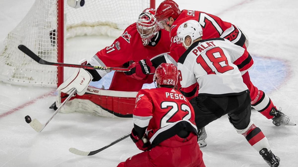 Carolina Hurricanes goalie Frederik Andersen (31) stops a scoring attempt by New Jersey Devils Ondrej Palat (18) in the second period during Game 1 of their second round Stanley Cup playoff series on Wednesday, May 3, 2023 at PNC Arena in Raleigh, N.C.
