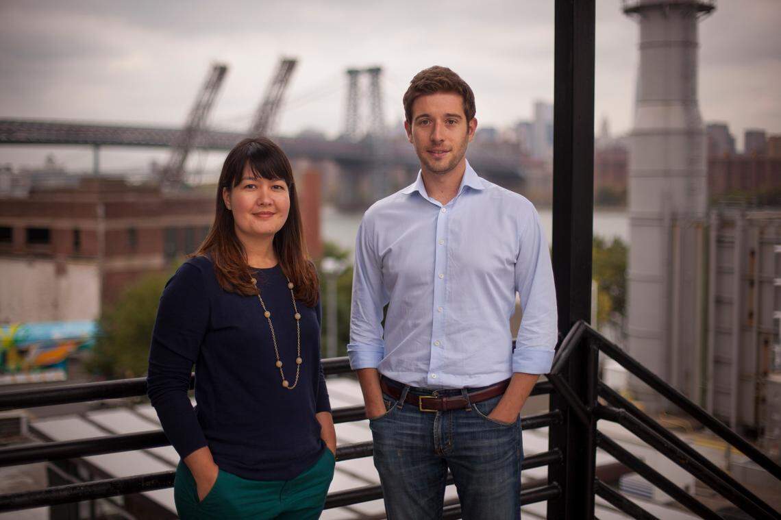 Policygenius founders Jen Fitzgerald, left and Francois de Lame, right, pose for a portrait in Brooklyn. The company announced on Thursday, Aug. 29, 2019, that it would open an office in Durham, N.C.