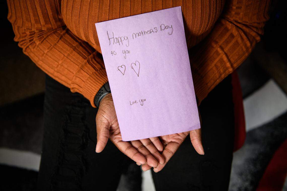 Jane holds up a handmade Mother’s Day card she received from her son this year. He has bounced between facilities, included an institution out of state. When they toured his room at one facility, Jane was uneasy. USA TODAY Network is not using her real name because her son is still under institutional care as a minor and she fears staff retribution. The room they toured was gray with no windows, and the bathroom looked unclean. There was only one bathroom for six children. ÒIt just felt like jail,Ó she said. ÒI didnÕt want to leave.Ó