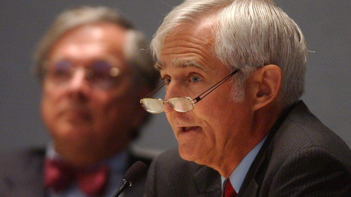 In this 2007 file photo, former NC Supreme Court Justice Willis Whichard, right, makes opening remarks to a panel  during the first day of an official review of the Durham Police Department’s handling of the Duke lacrosse case. Whichard died Tuesday in Chapel Hill at the age of 85.