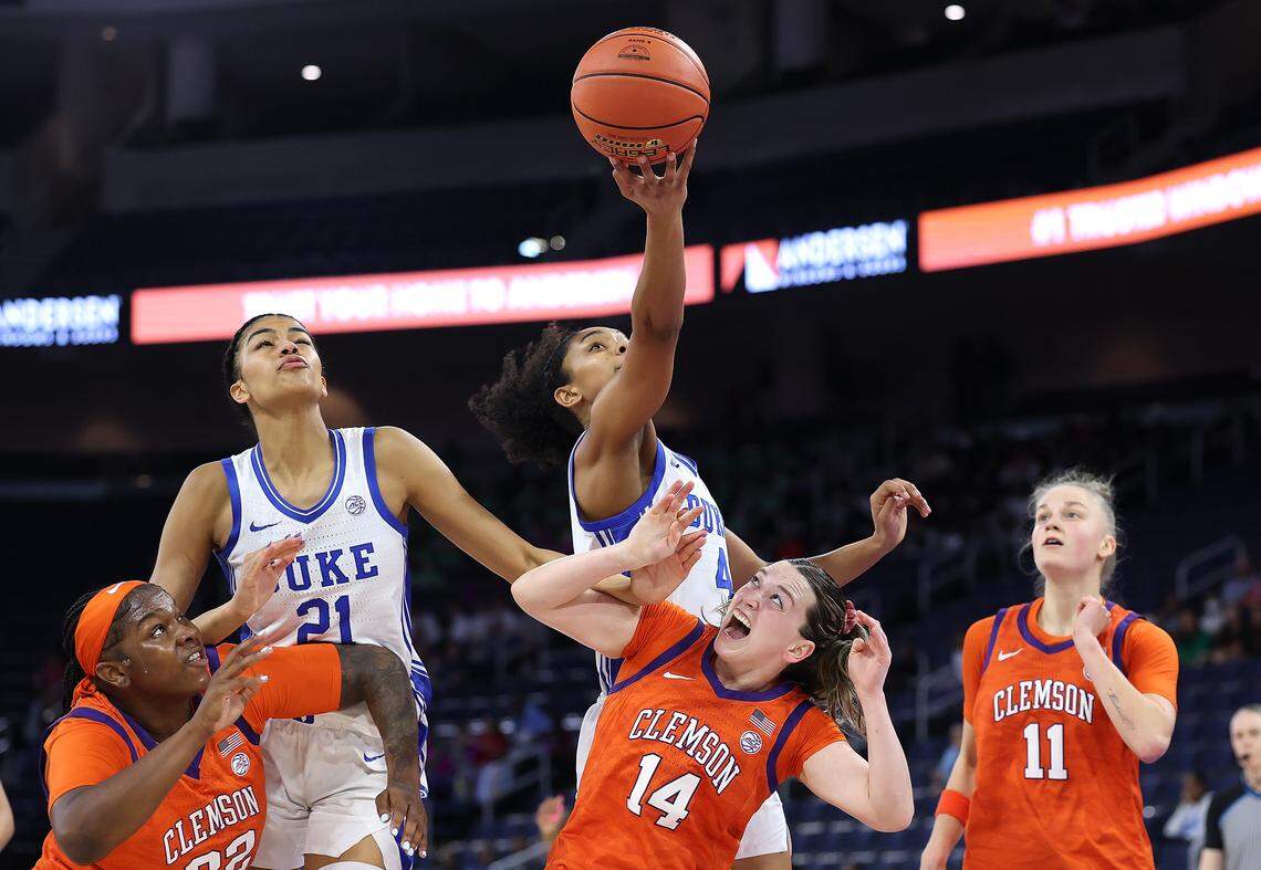 Riley Nelson (4) of the Duke Blue Devils grabs a rebound against Rachael Rose (14) of the Clemson Tigers during the first quarter of their Women’s ACC Tournament quarterfinal at Gas South Arena on March 6, 2026 in Duluth, Georgia.