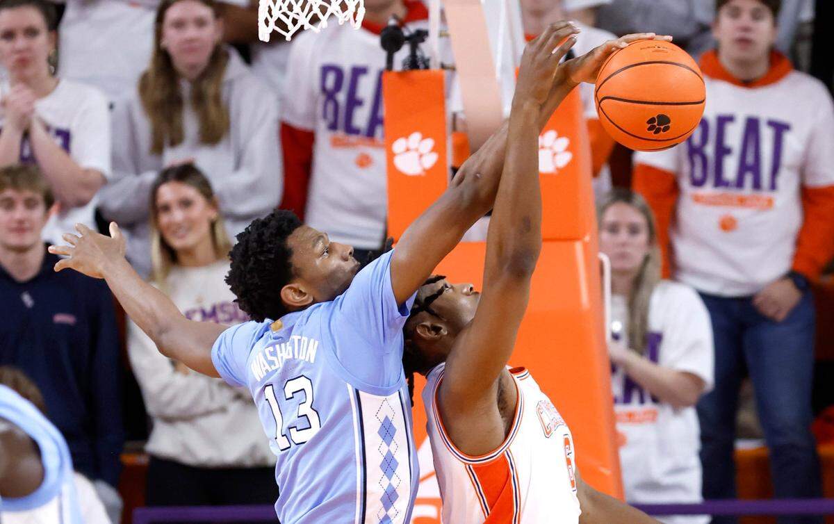 North Carolina’s Jalen Washington (13) blocks the shot by Clemson’s Myles Foster (6) during the first half of UNC’s game against Clemson at Littlejohn Coliseum in Clemson, S.C., Monday, Feb. 10, 2025.
