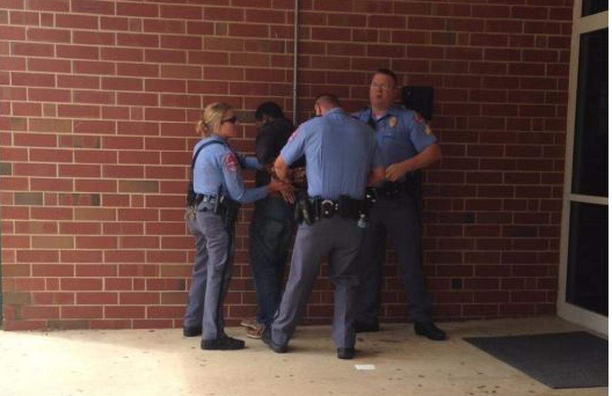 Kevin Hines was charged with trespassing after he objected to the treatment of a Black student by a white officer at Enloe High School in May 2013. 