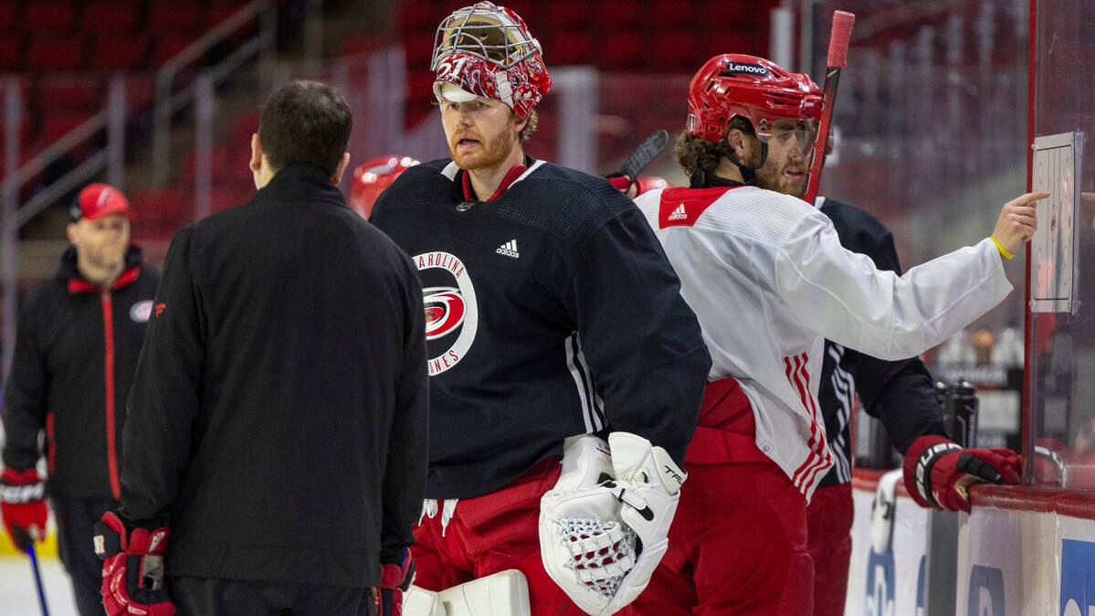 Carolina Hurricanes goaltender Frederik Anderson (31) talks with goaltending coach Paul Schonfelder during their practice on Thursday, May 2, 2024 at PNC Arena in Raleigh, N.C.