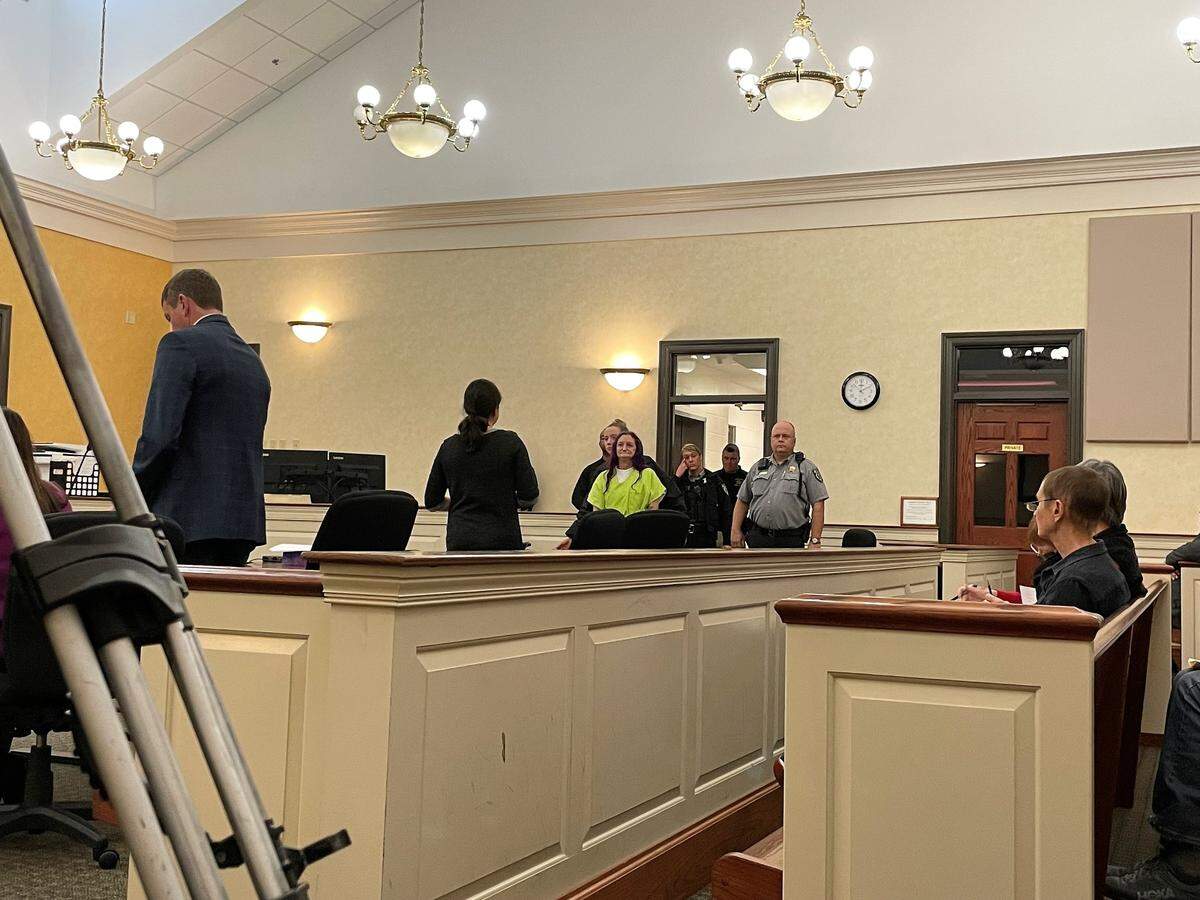 Orange County Sheriff’s deputies escort Paula Lee Decoteau, 51, into a court hearing in Hillsborough on Monday afternoon, Dec. 12, 2022. Decoteau is accused of shooting and killing her 75-year-old mother.