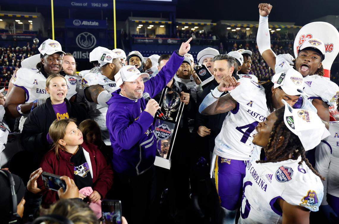 East Carolina head coach Blake Harrell acknowledges the fans after ECU’s 26-21 victory over N.C. State in the Military Bowl at Navy-Marine Corps Memorial Stadium in Annapolis, Md., Saturday, Dec. 28, 2024.