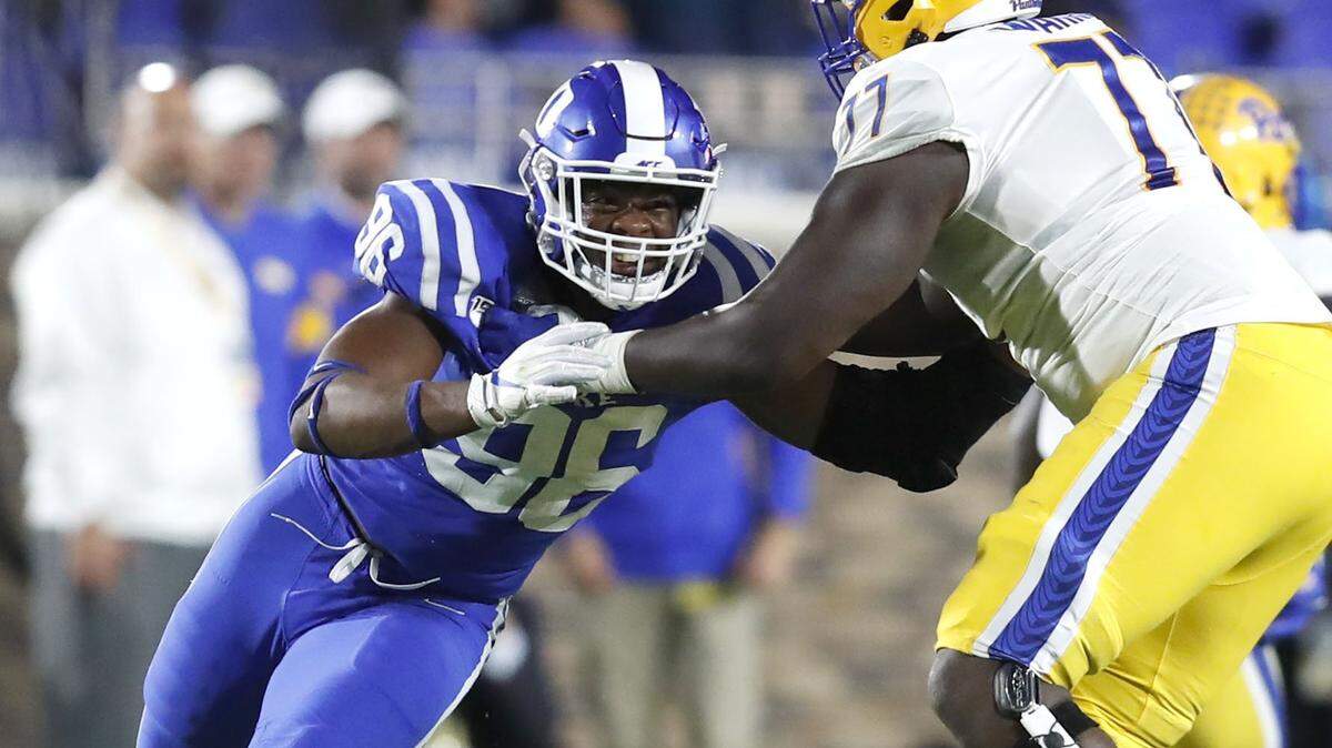 Duke defensive end Chris Rumph II (96) works his away around Pittsburgh offensive lineman Carter Warren (77) during the first half of Duke’s game against Pittsburgh at Wallace Wade Stadium in Durham, N.C., Saturday, Oct. 5, 2019.