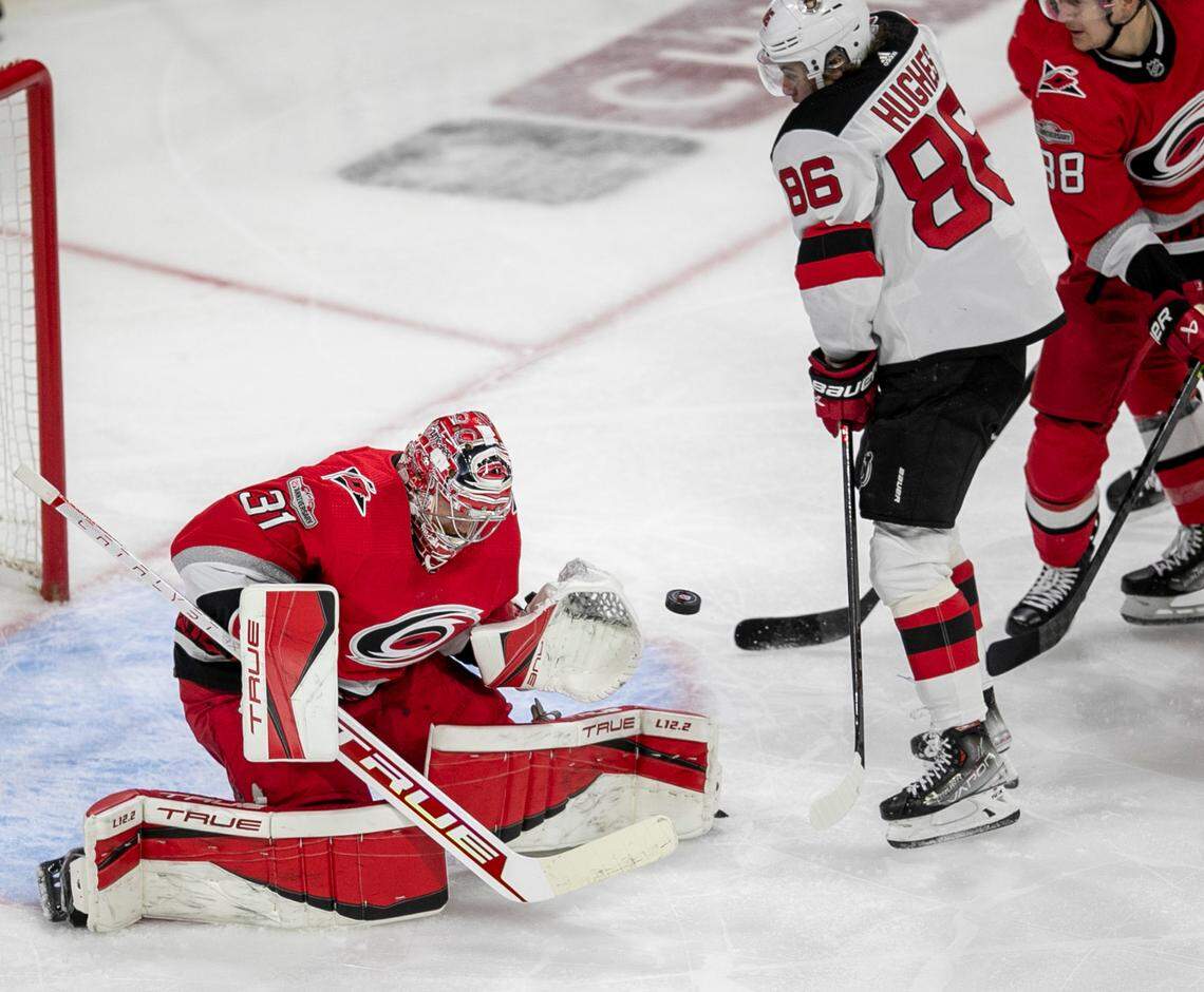 Carolina Hurricanes goalie Frederik Andersen (31) stops a scoring attempt by the New Jersey Devils Jack Hughes (86) in the second period during Game 1 of their second round Stanley Cup playoff series on Wednesday, May 3, 2023 at PNC Arena in Raleigh, N.C.