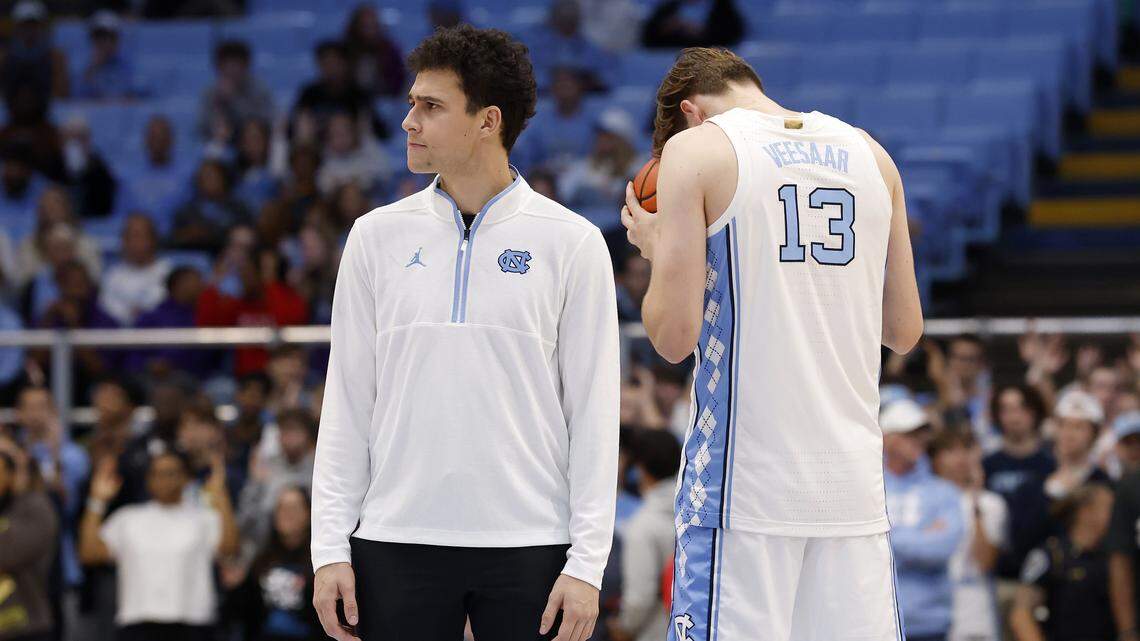 Luka Bogavac, left, stands on the court prior to the Tar Heels’ exhibition game against Winston-Salem State on Wednesday, Oct. 29, 2025, at the Smith Center in Chapel Hill, N.C. Luka Bogavac, left, stands on the court prior to the Tar Heels’ exhibition game against Winston-Salem State on Wednesday, Oct. 29, 2025, at the Smith Center in Chapel Hill, N.C.