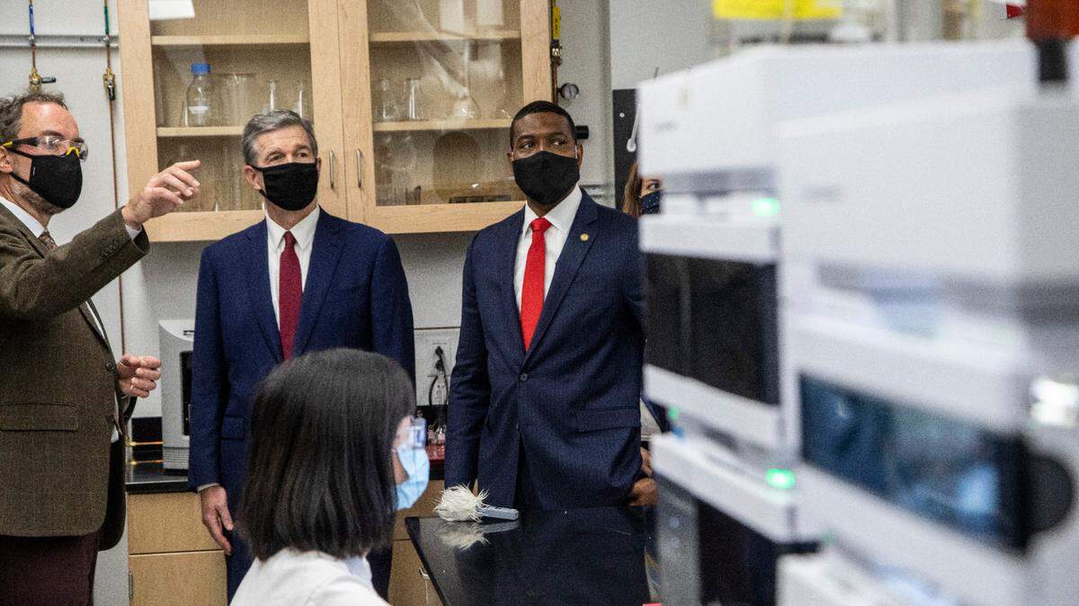 The Environmental Protection Agency this week announced a hazard index that would evaluate the total risk from GenX and three other forever chemicals. Here, EPA Administrator Michael Regan is shown touring an NC State University lab that tests for the chemicals.