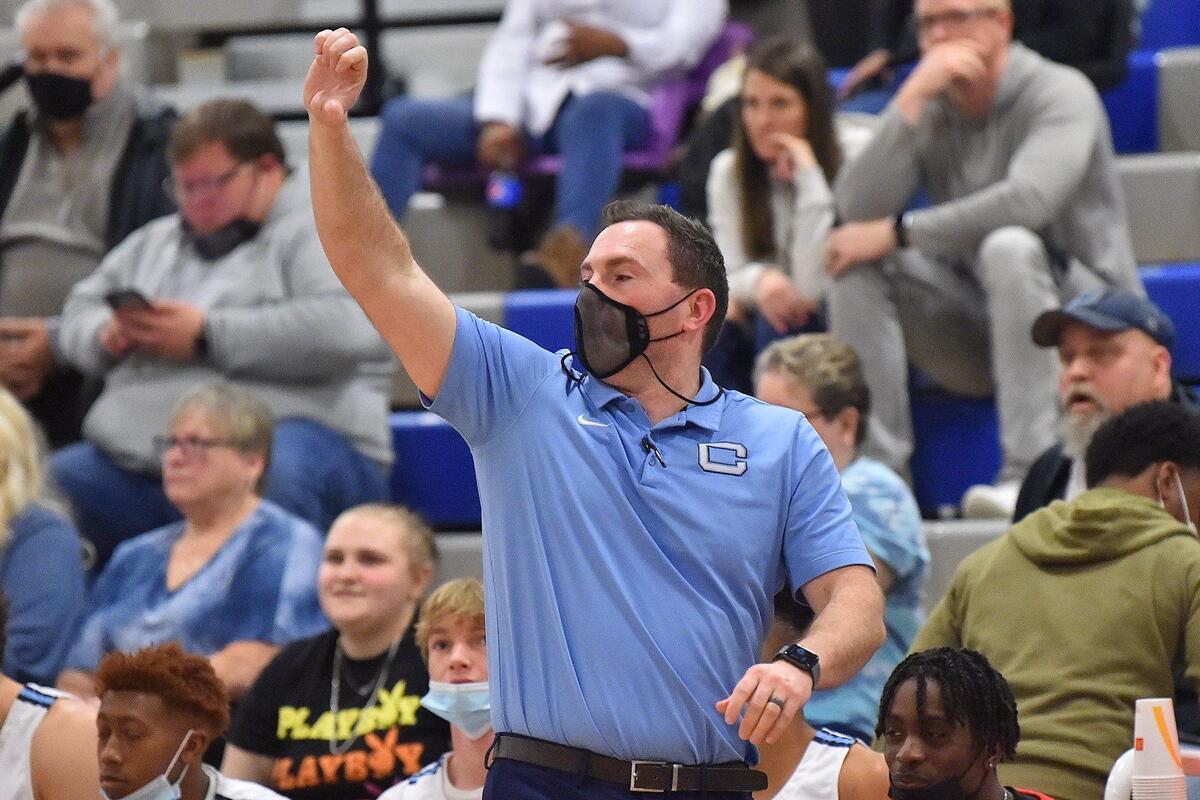 Cleveland head coach Justin Batts gives orders to his team. The Cleveland Rams and the Fuquay-Varina Bengals met in the Greater Neuse Conference Championships in Garner, N.C. on February 18, 2022.