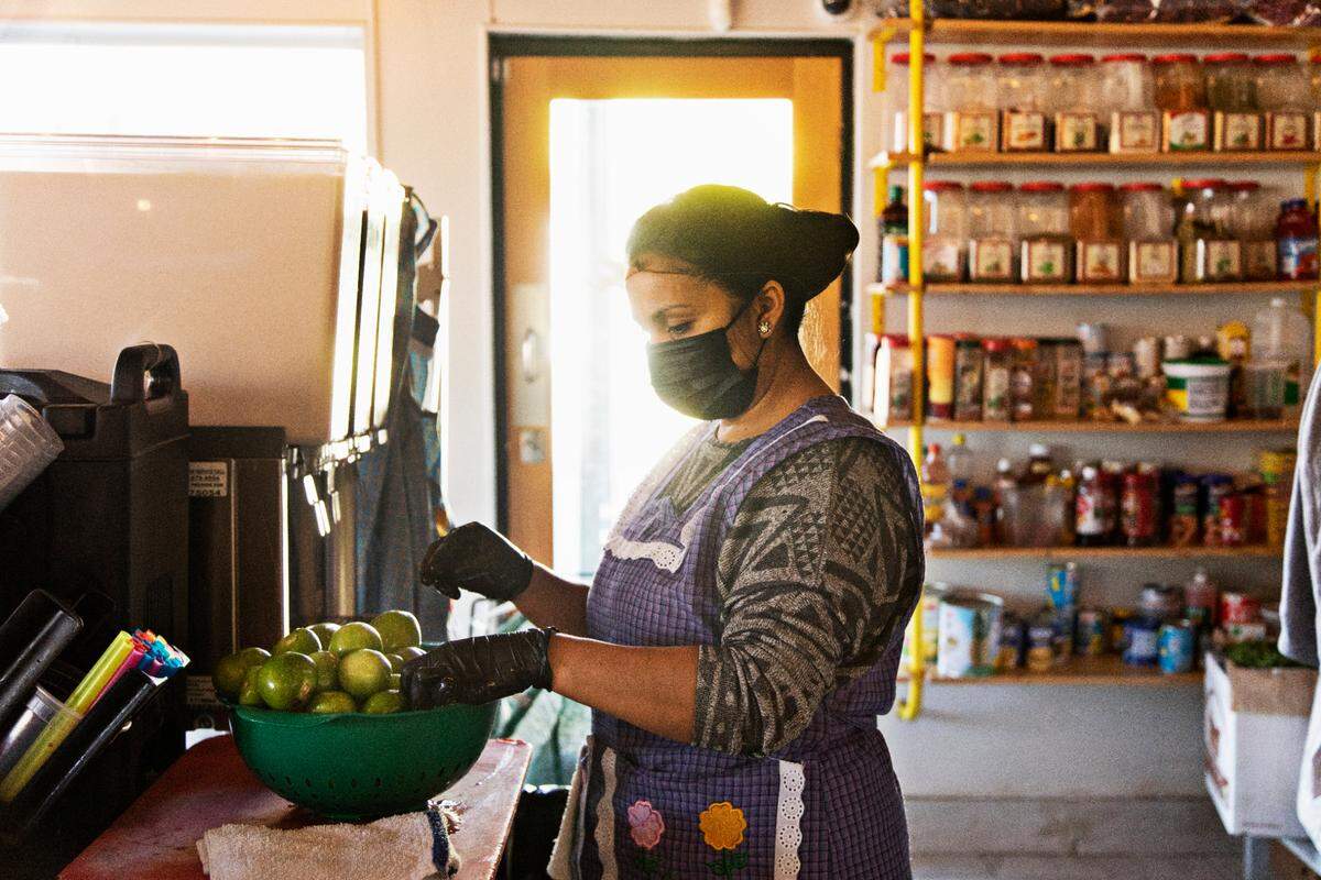 Kitchen staff at Fonda Lupita prep food for the day on Wednesday morning, Jan. 19, 2022. The restaurant serves homestyle Mexican food, including salsas made from fresh tomatillos.