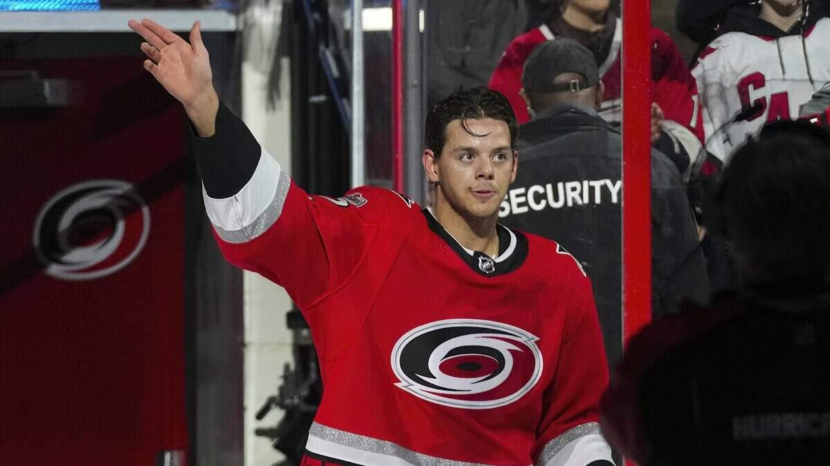 Mar 14, 2023; Raleigh, North Carolina, USA; Carolina Hurricanes center Jesperi Kotkaniemi (82) comes out onto the ice after the game against the Winnipeg Jets at PNC Arena. Mandatory Credit: James Guillory-USA TODAY Sports