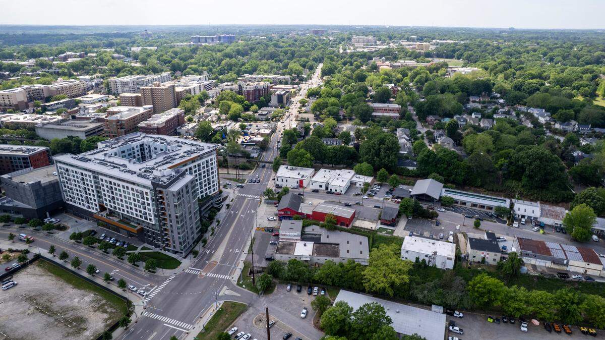 An aerial view of the Smoky Hollow district in Raleigh shows the site where a construction of 30-story tower is being proposed across from a 12-story high-rise that currently houses apartments and Publix near the historic Glenwood-Brooklyn neighborhood bordering the northern edge of downtown Raleigh.