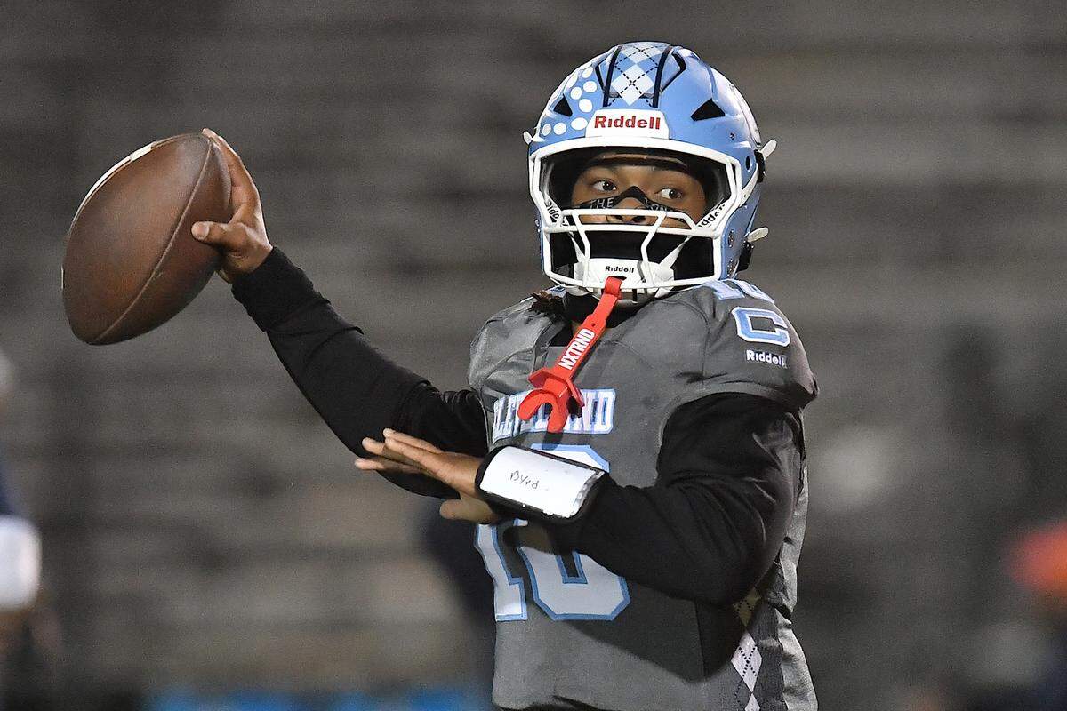 Cleveland quarterback Jackson Byrd (10) looks to pass during pregame before taking on Heritage. The Cleveland Rams and the Heritage Huskies met in the first round of the NCHSAA 4A playoffs in Clayton, N.C. on November 15, 2024.