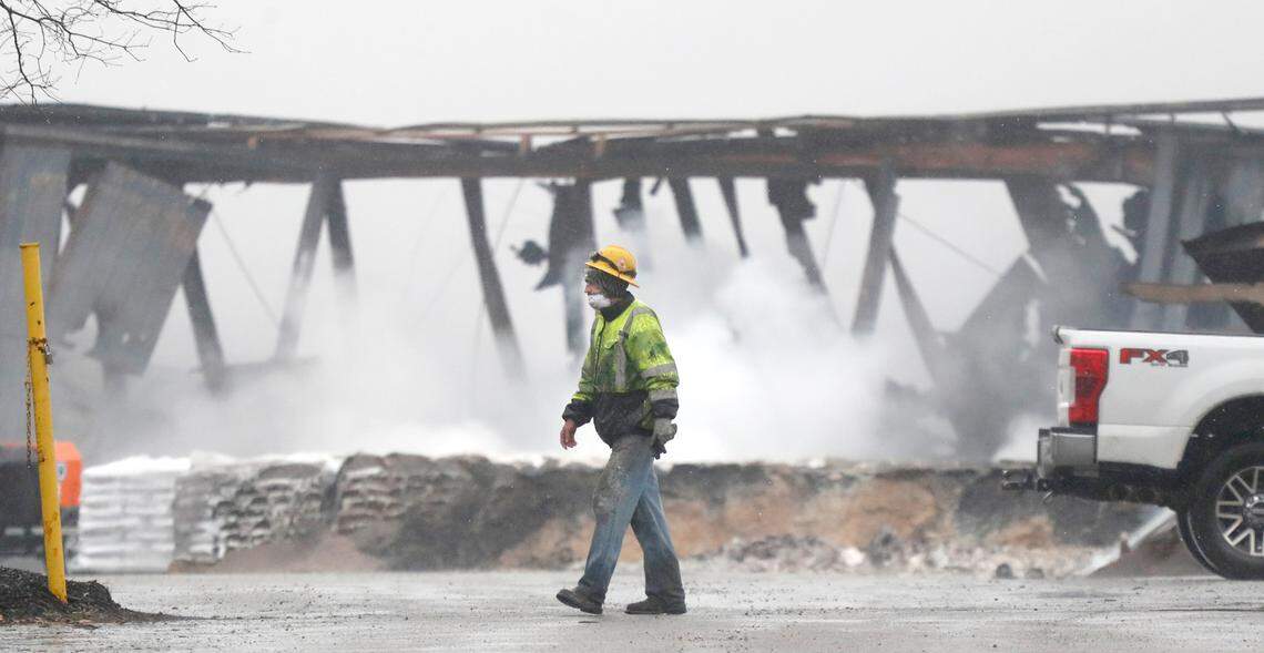 Smoke continues to rise from the remains of the Winston Weaver Company fertilizer plant in Winston-Salem, N.C., Thursday, Feb. 3, 2022.